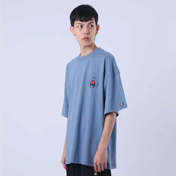 T79188B-5861NB-2-453 CAMISETA OVERSIZED CHAMPION SWEAT AND TEARS AZUL
