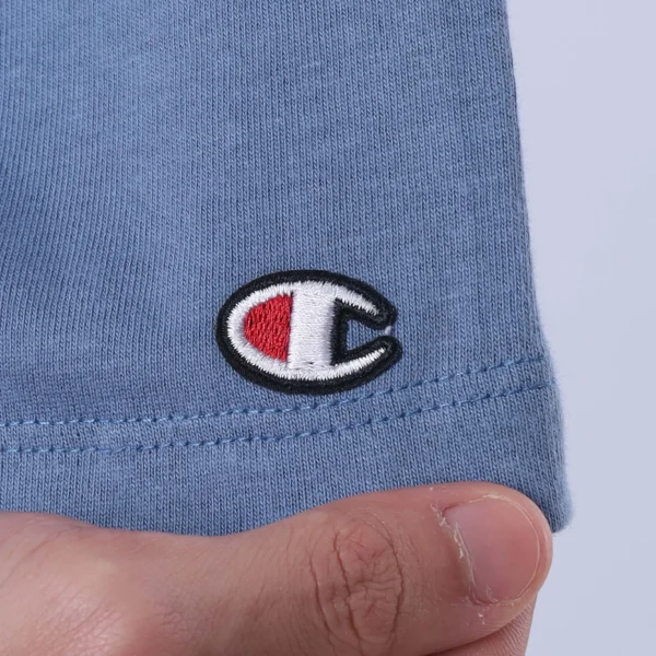 T79188B-5861NB-6-453 CAMISETA OVERSIZED CHAMPION SWEAT AND TEARS AZUL