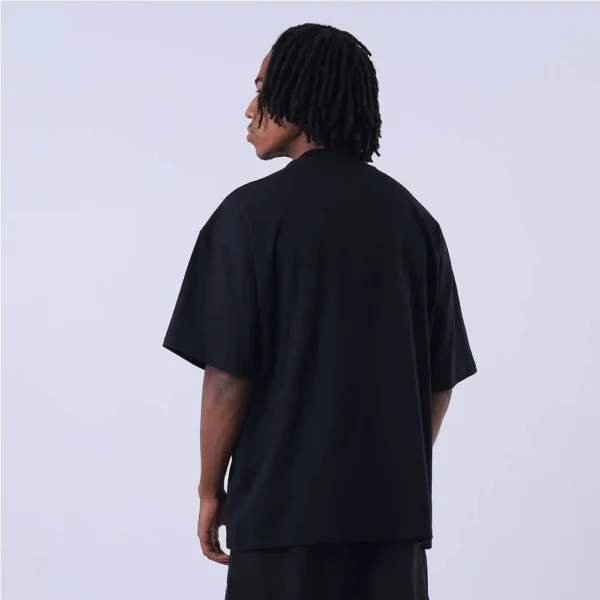 T79188B-CLOGEVA-3-009 CAMISETA OVERSIZED CHAMPION C LOGO SURTON PRETA