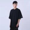CAMISETA OVERSIZED CHAMPION MINI SCRIPT SURTON PRETA