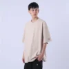 CAMISETA OVERSIZED CHAMPION MINI SCRIPT SURTON BEGE