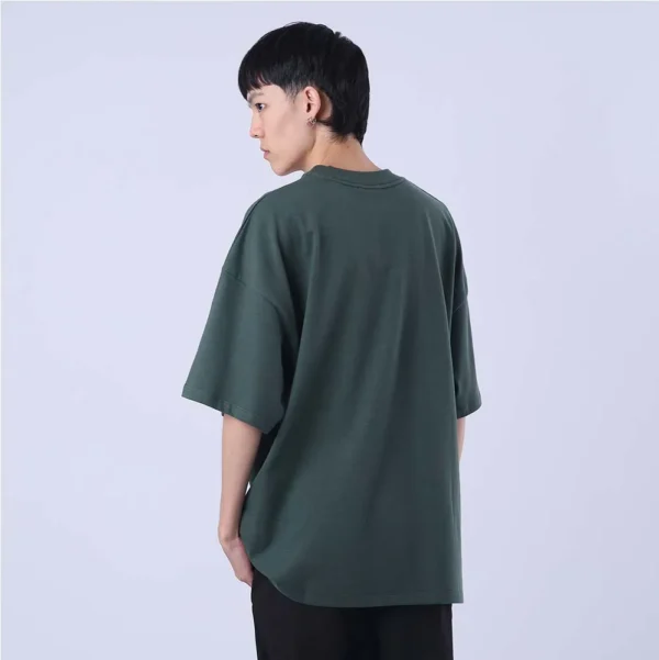 T79188B Y08541-3-449 CAMISETA OVERSIZED CHAMPION MINI SCRIPT SURTON VERDE MILITAR