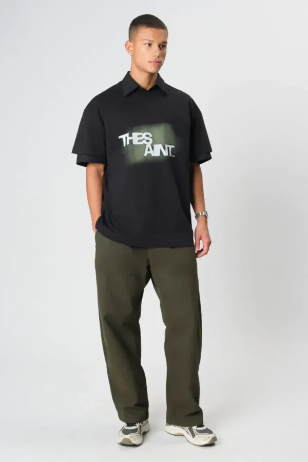 14.02.01.542.002-4_grgy5dpdmcrgng2e CAMISETA BOXY THE SAINT SPRAY PRETA