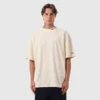 CAMISETA OVERSIZED CHAMPION LIFE PIQUET SCRIPT LOGO EMB